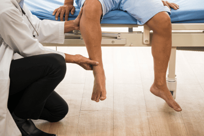 doctor examining legs (1)
